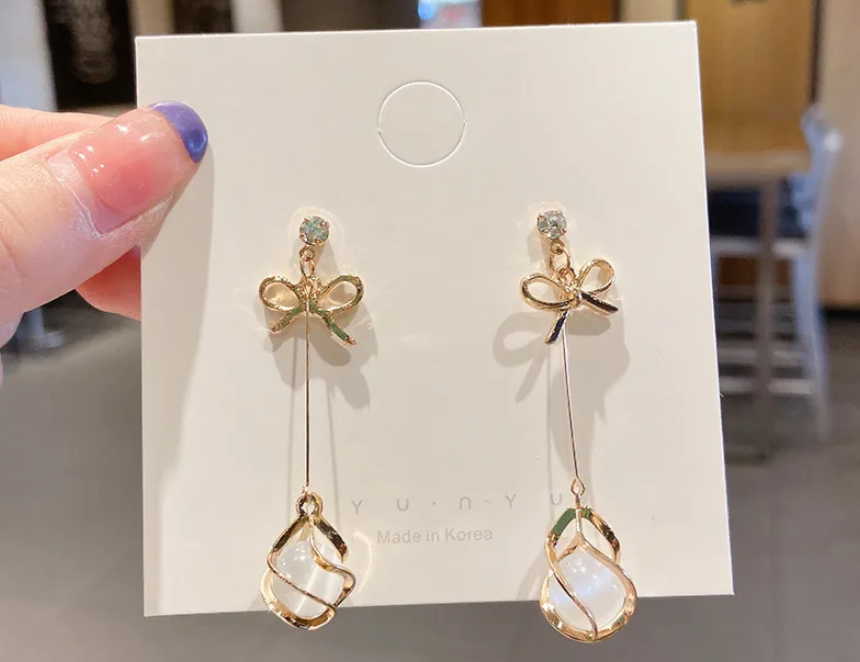 new geometric earring gold bowknot cat eye (10 pieces) new geometric earring gold bowknot cat eye (10 pieces)